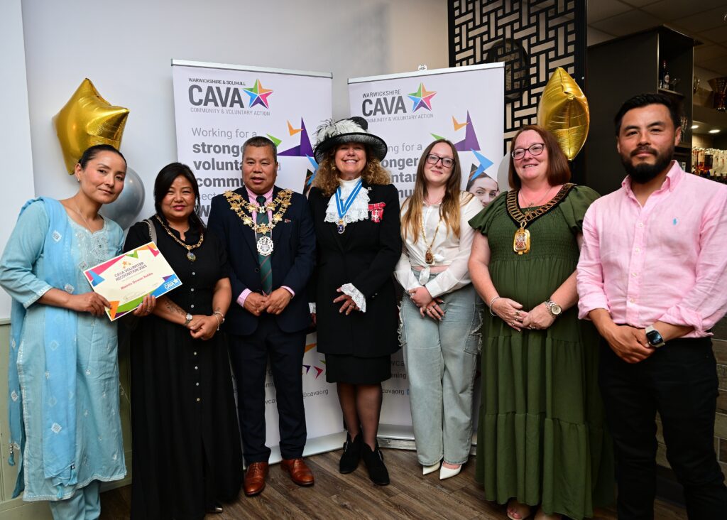 Volunteers, community leaders, and dignitaries at the North Warwickshire volunteer celebration event